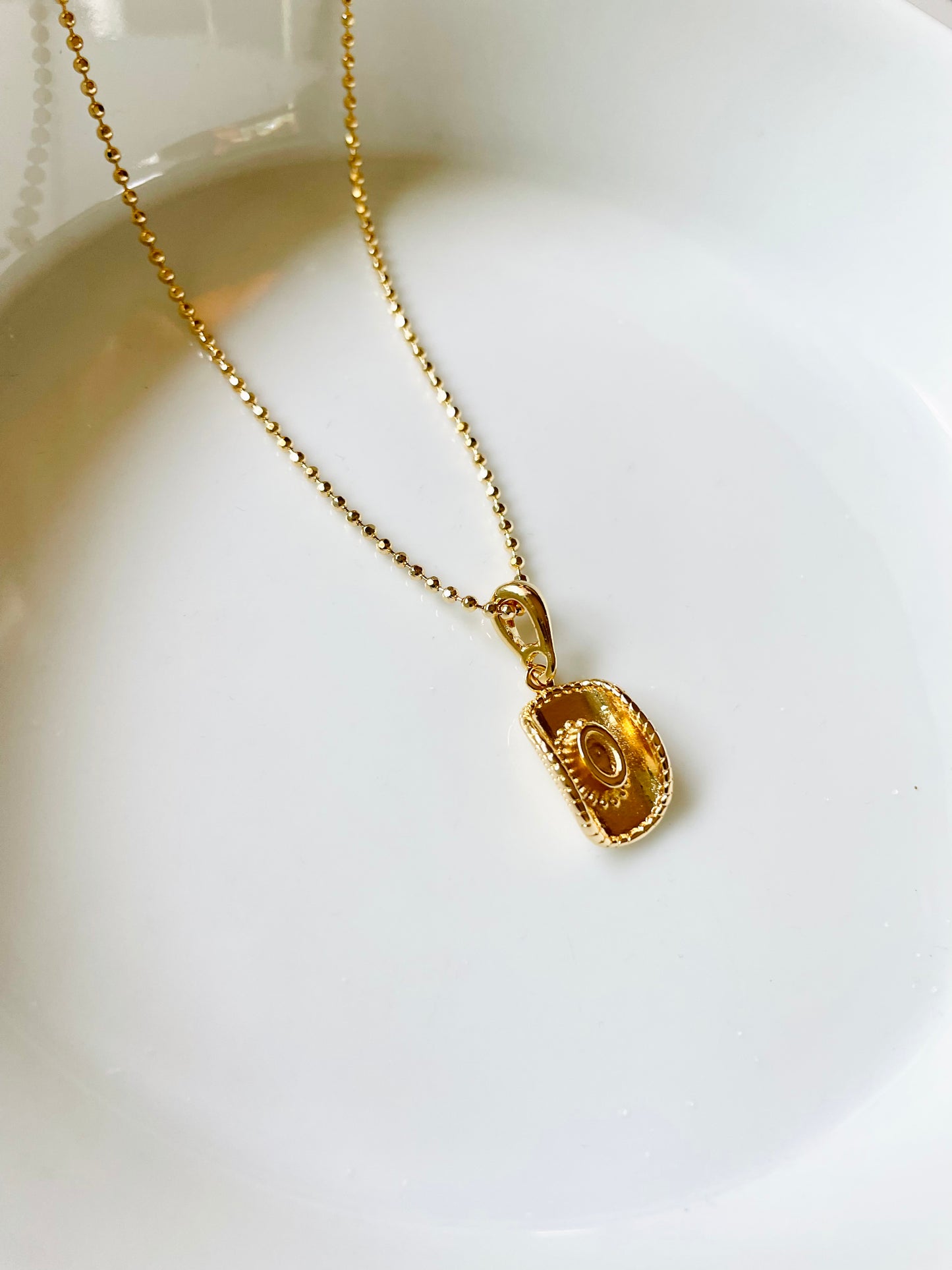 Cowboy hat necklace