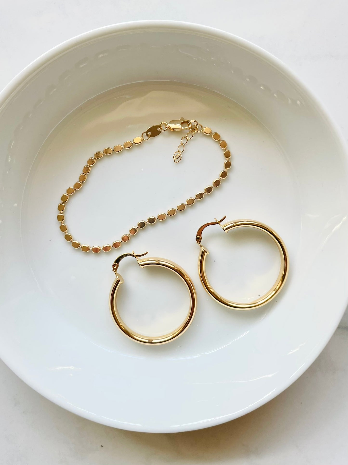 Flat disk bracelet